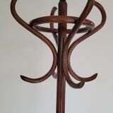 Wooden parrot coat rack on foot