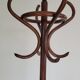 Wooden parrot coat rack on foot