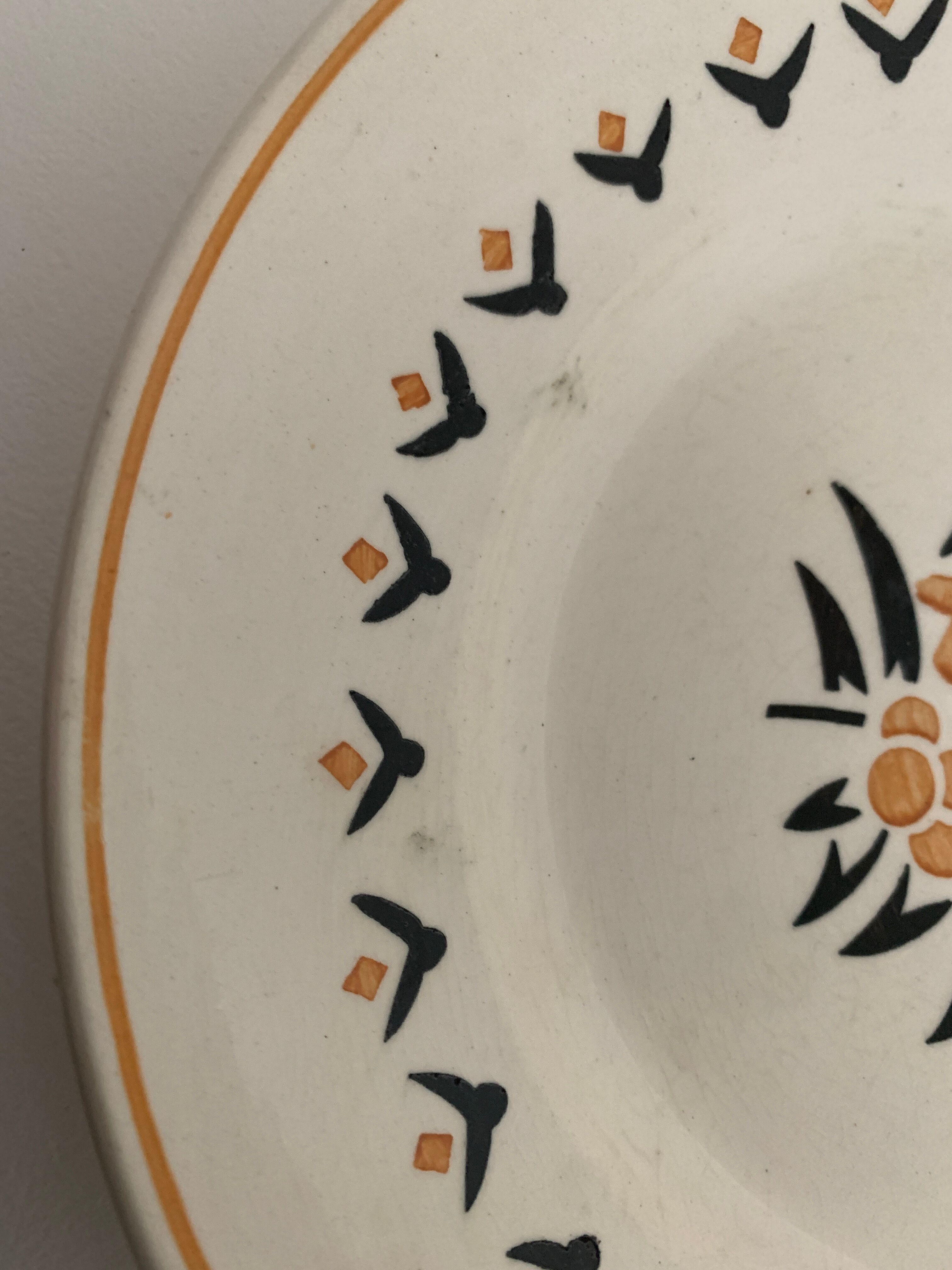 7 dessert plates and one Longwy dish