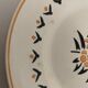 7 dessert plates and one Longwy dish