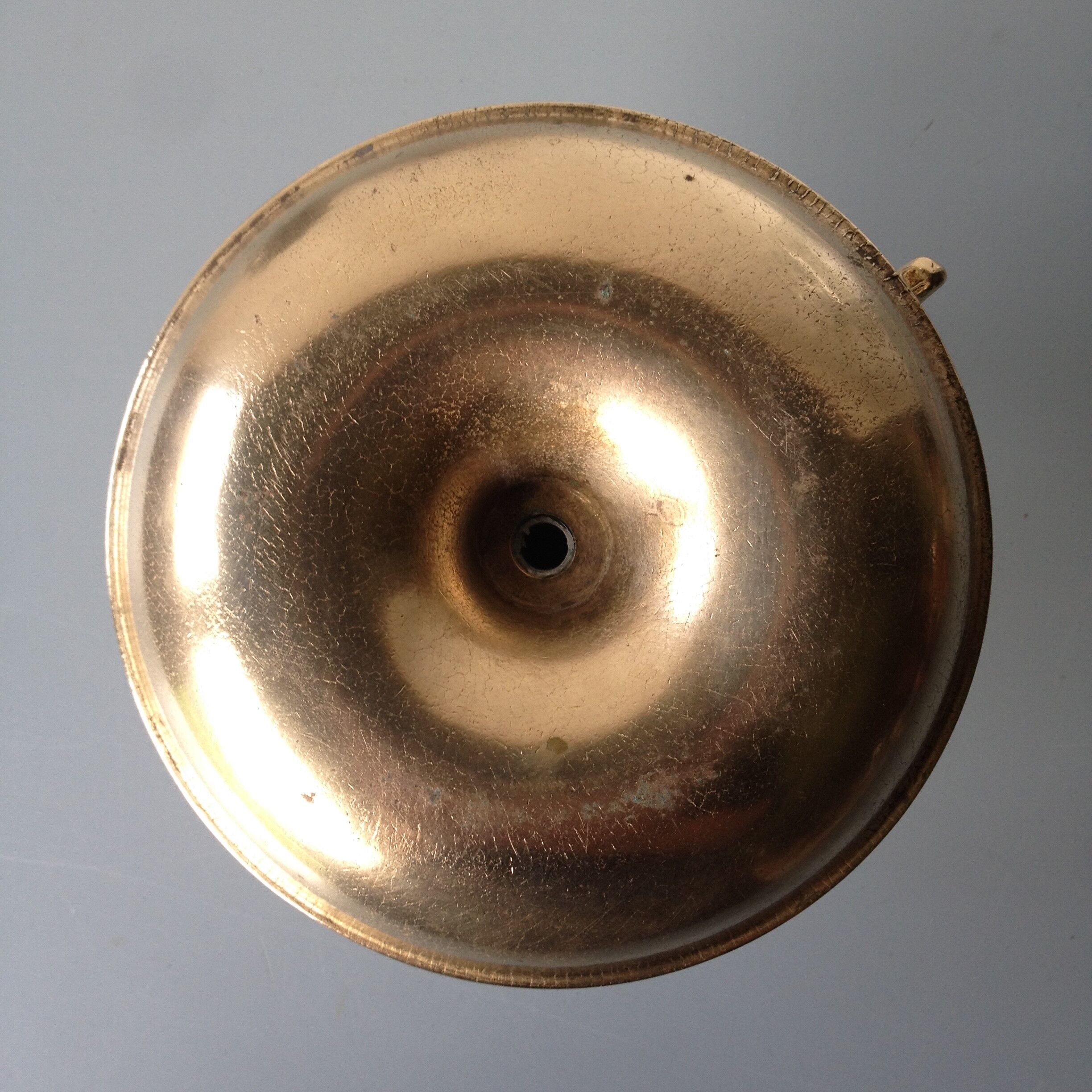 Thumb taper brass candlestick