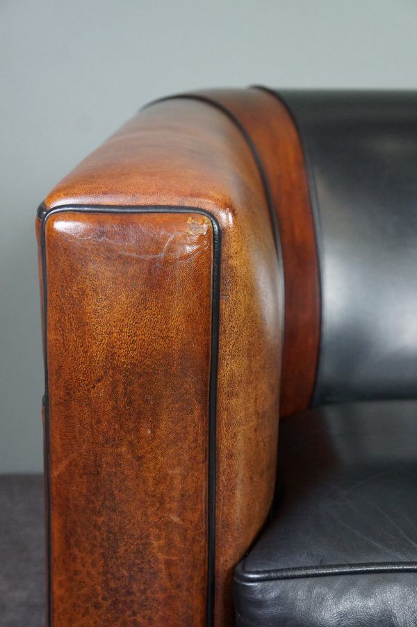 2.5-seater art deco style sofa in sheepskin