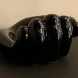 Black ceramic ashtray left hand