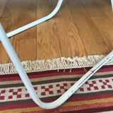 Metal folding chair by Talin Editions