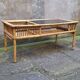 Table basse en rotin et verre fumé