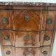 Transitional style chest of drawers in rosewood and amaranth veneer, 20th century.