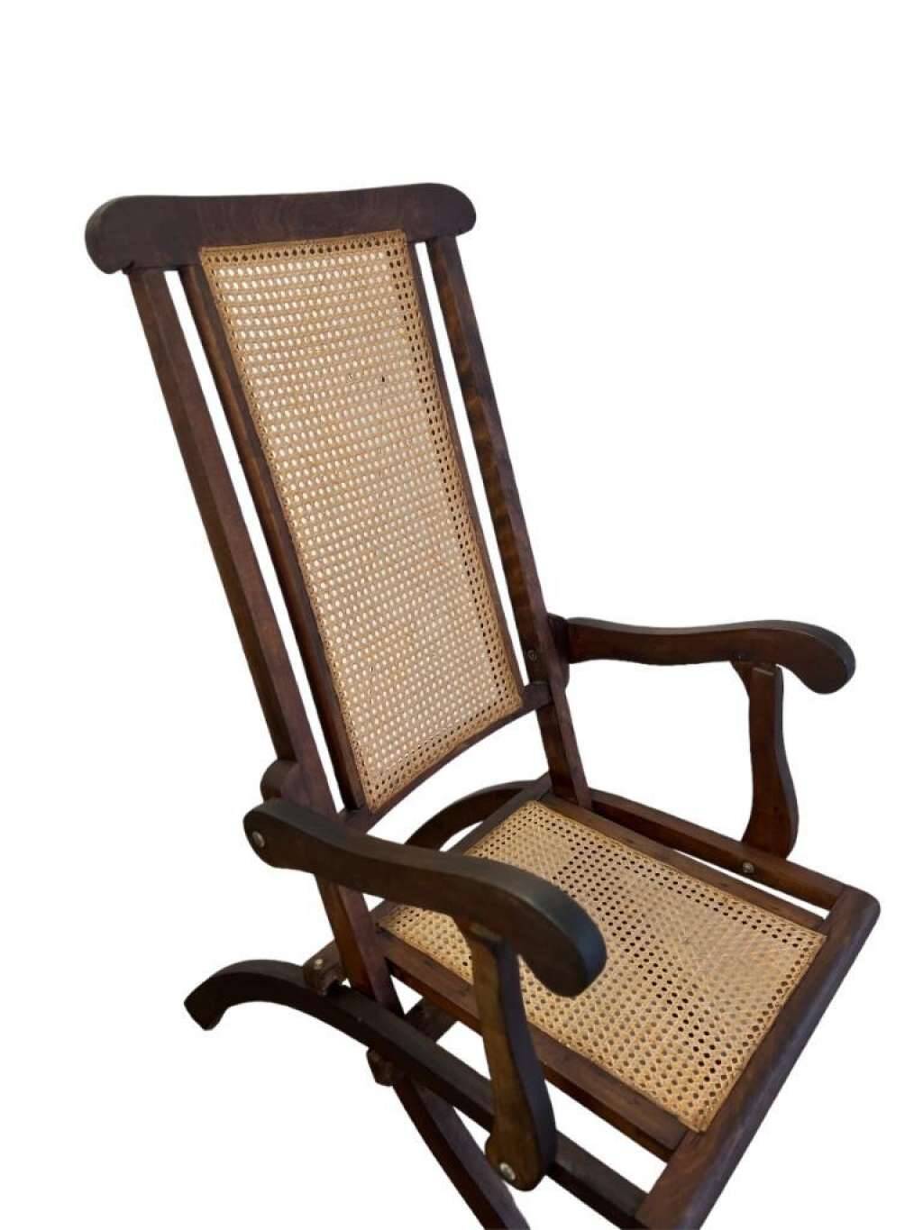 Antique folding chair with weaved seat/back