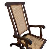 Antique folding chair with weaved seat/back