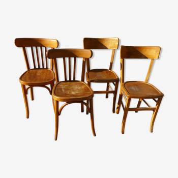 Set of 4 mismatched Luterma chairs