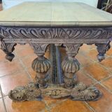 Rebirth table with oak dolphins