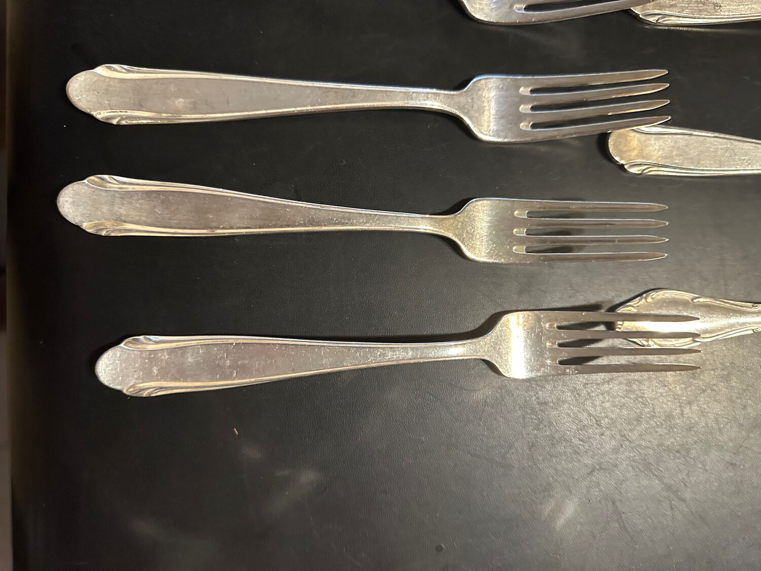 6 silver-plated spoons and 6 forks