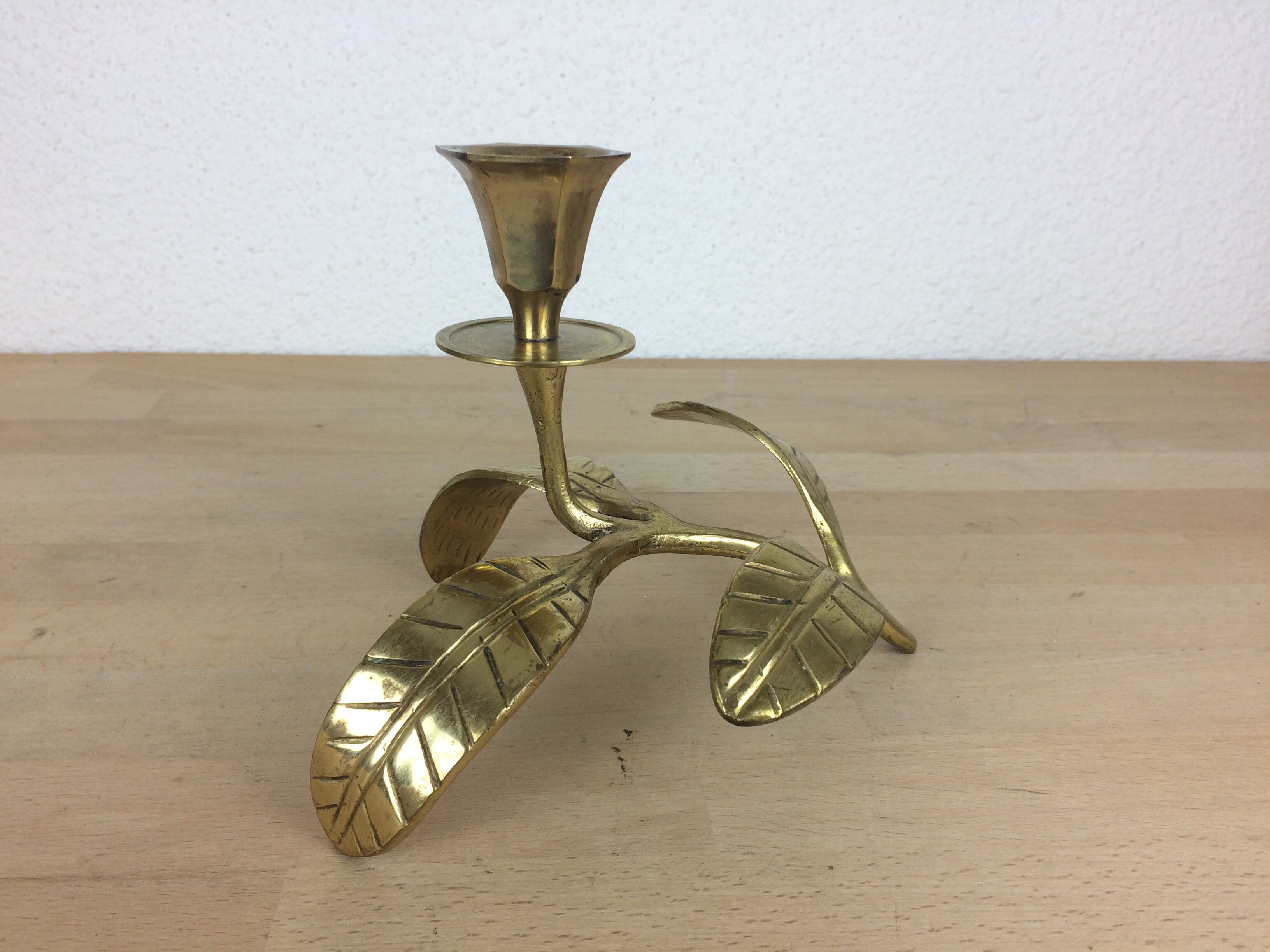 Candle holder flower leaves in golden brass