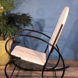 1950s perforated metal rocking chair