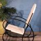 Fauteuil à bascule métal perforé 1950