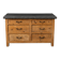 Old wooden workshop furniture with a stone top.