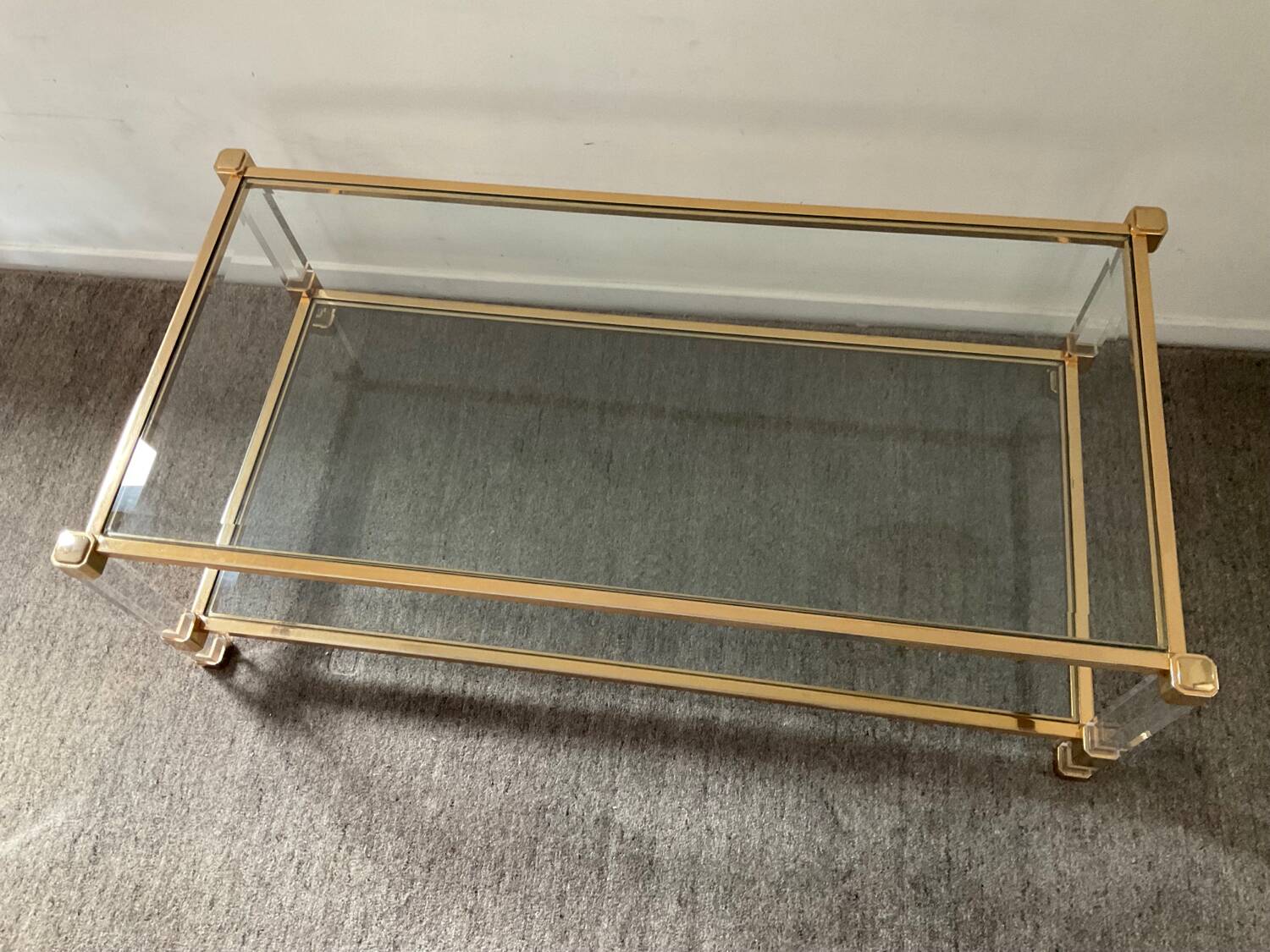 Vintage lucite and brass coffee table from the 70s