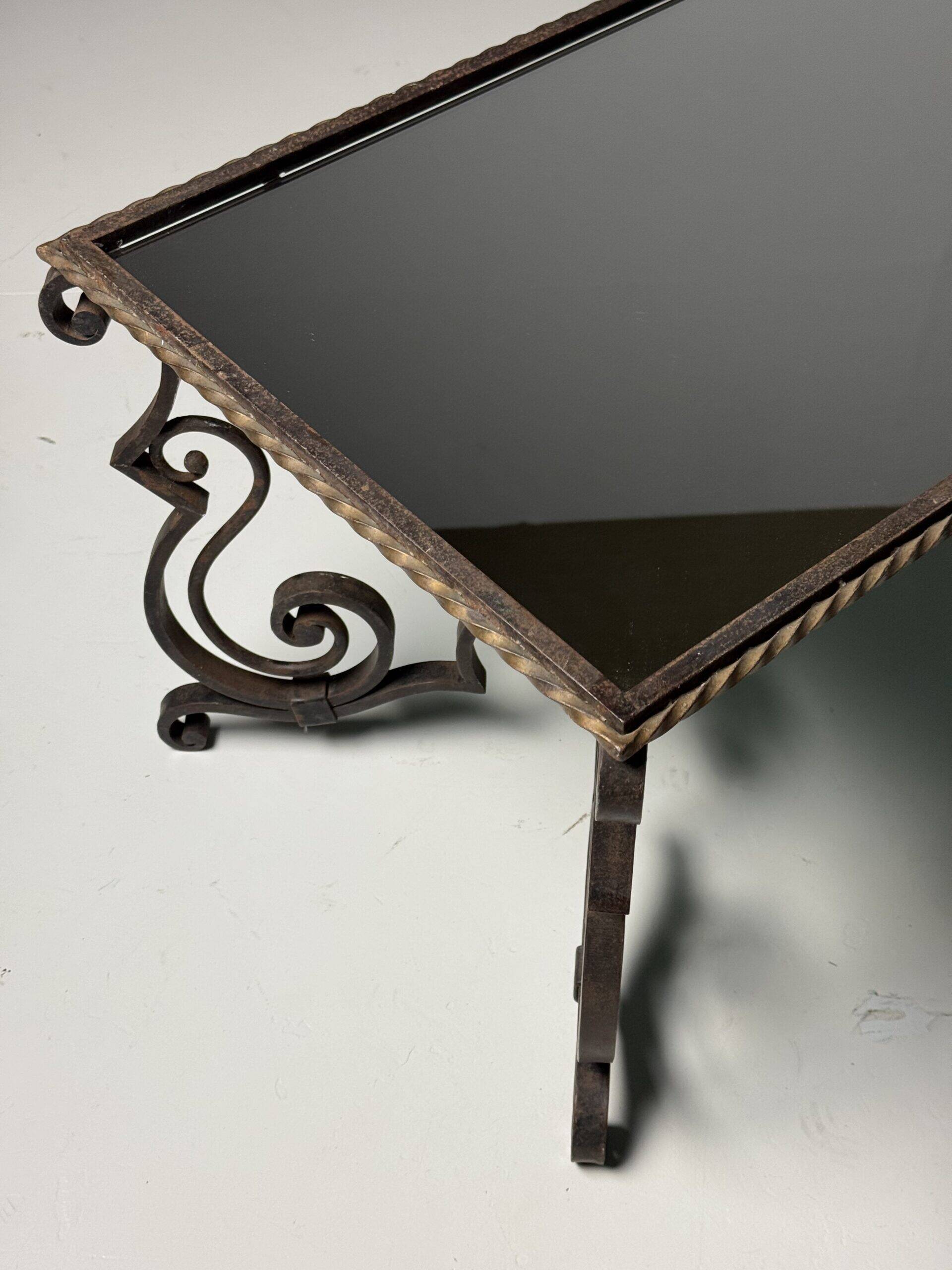 Wrought iron coffee table with mirror glass