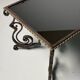 Wrought iron coffee table with mirror glass