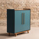 Vintage low sideboard restyled in blue with 2 swing doors and wooden base