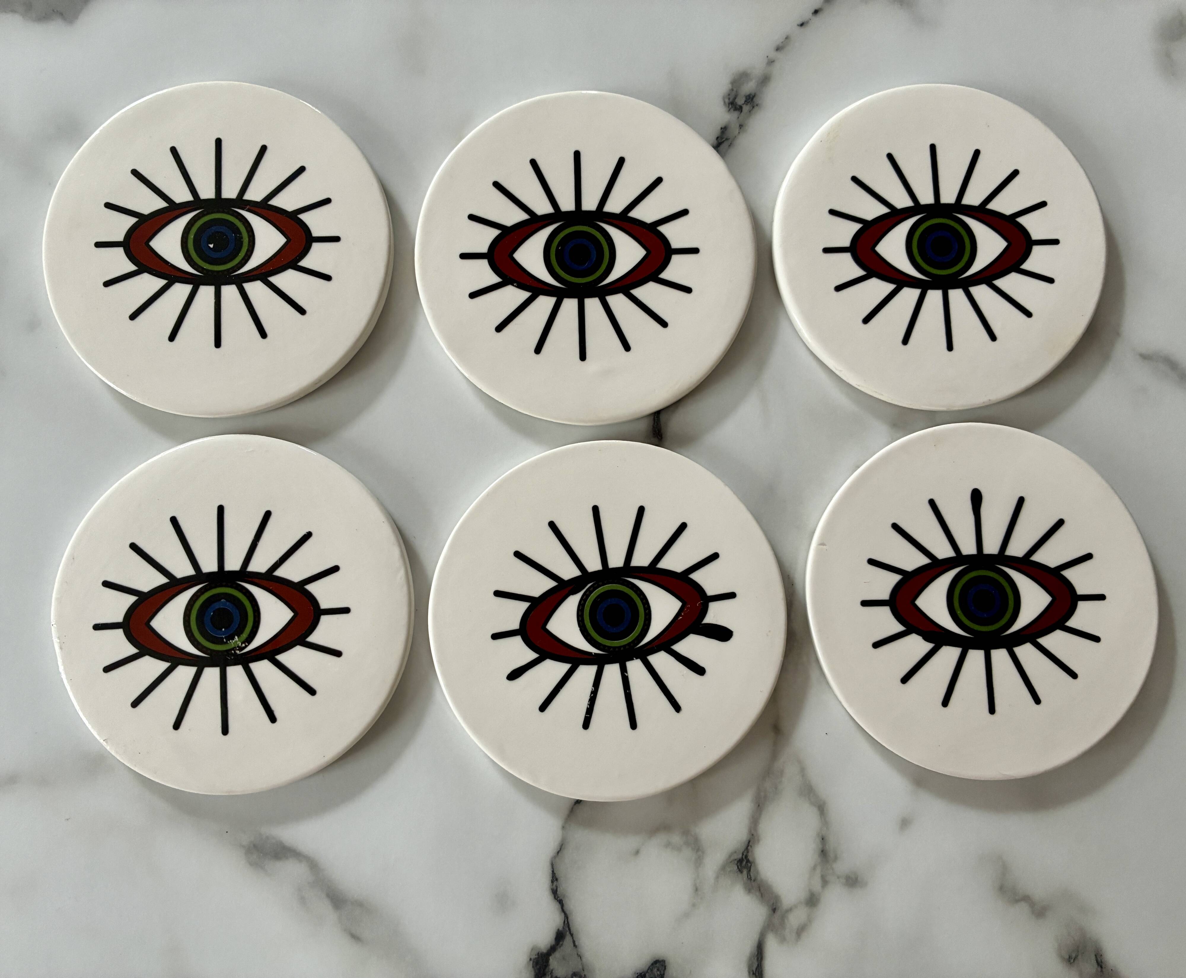 Lot of 6 ethnic ceramic coasters with eye design.