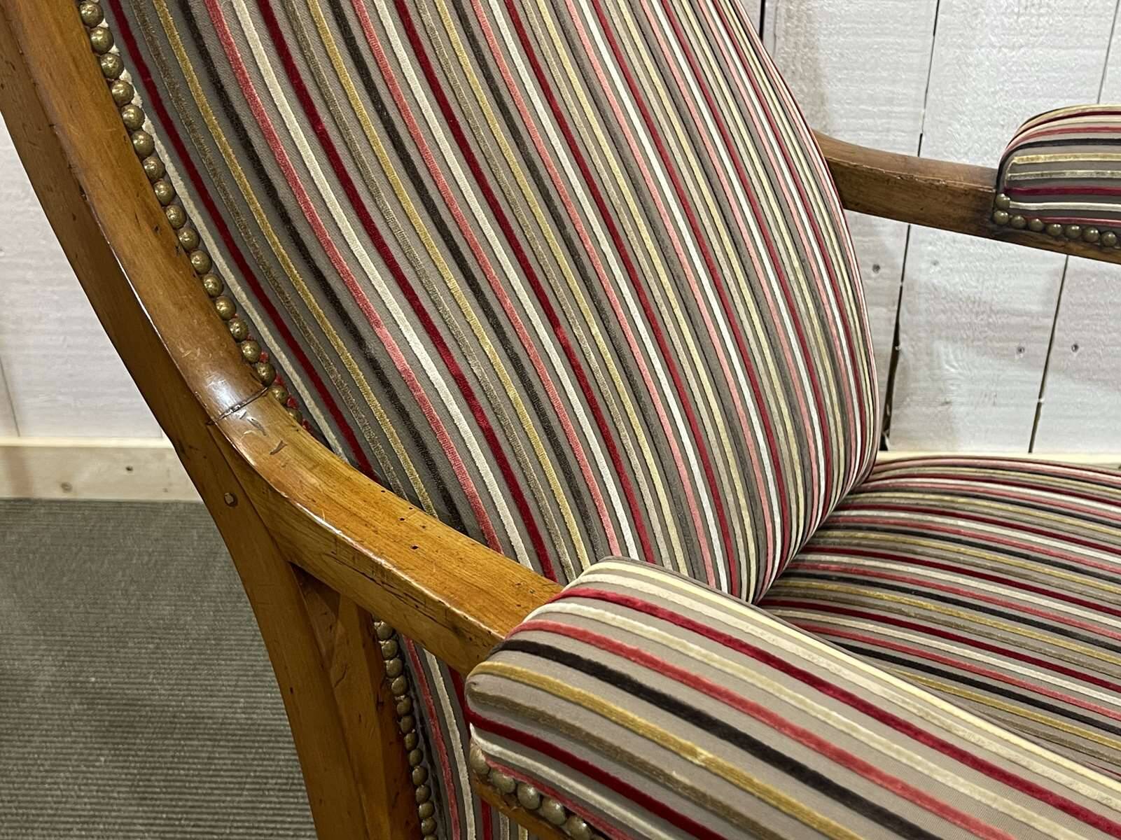 Voltaire III armchair, late 19th century, in cherry wood