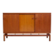 Modern mid-century teak sideboard with brass details.