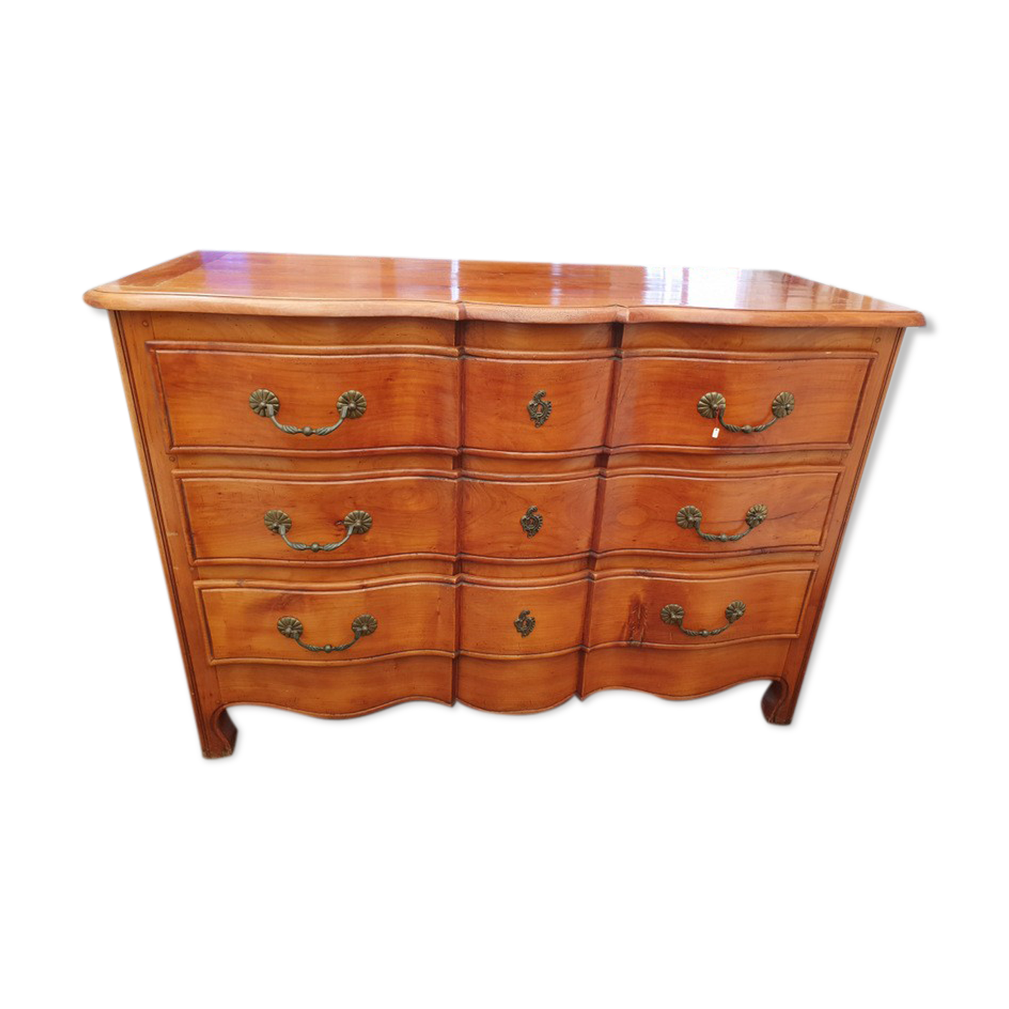 Crossbow chest of drawers with caramel patina