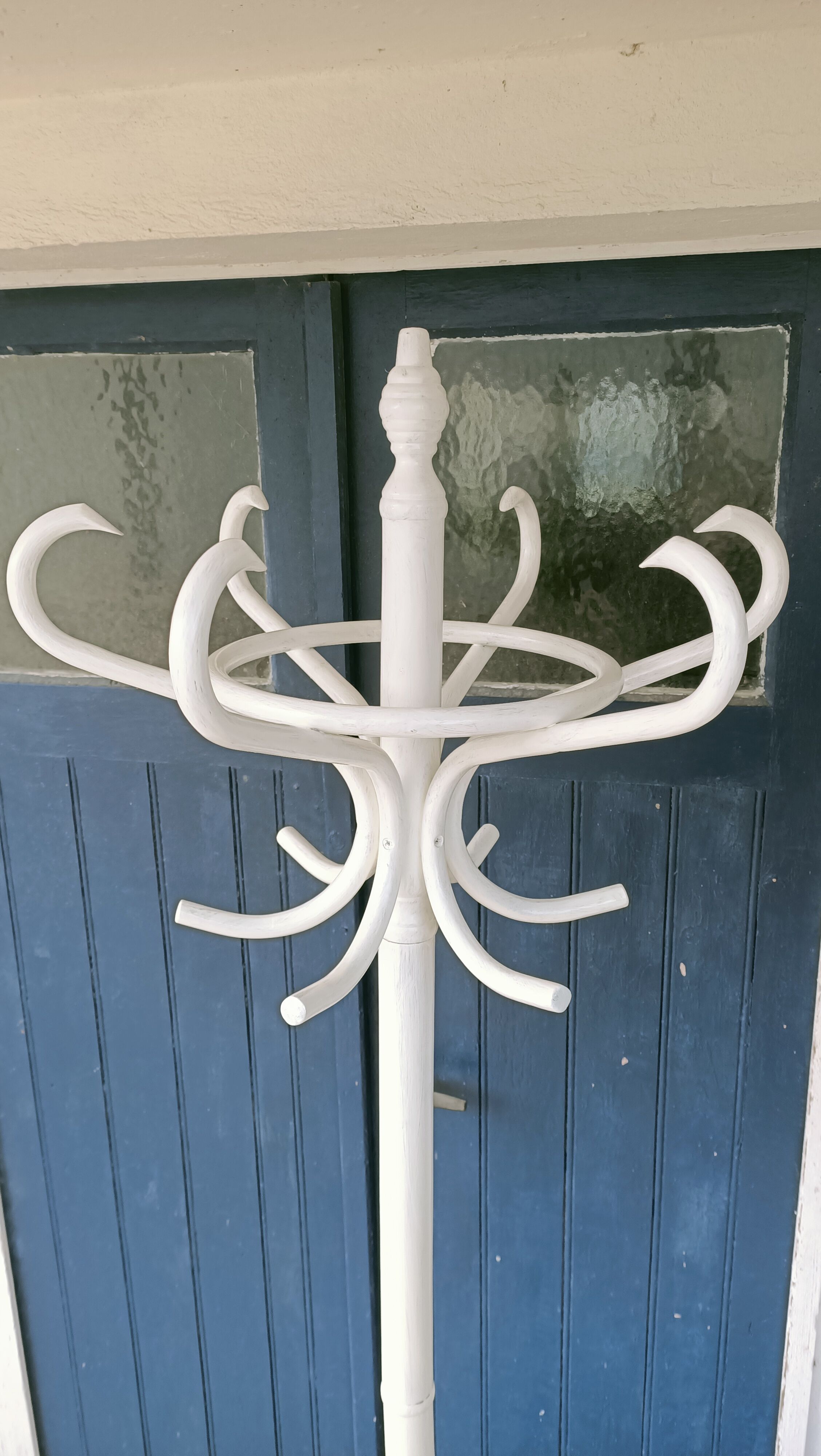 White parrot coat rack