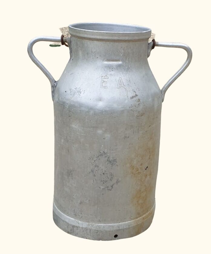 Umbrella-carrying milk can