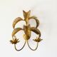 Golden palm leaf sconce
