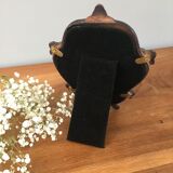 Vintage fiddle mirror to put down.