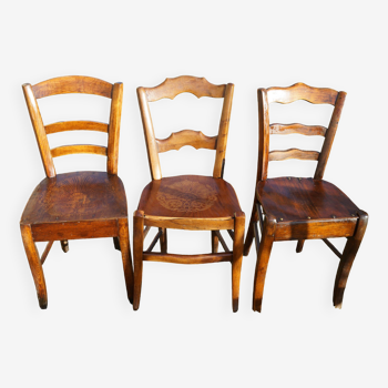 3 bistro chairs with patterns