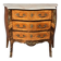 Louis XV style commode with rosewood veneer, gilded bronze mounts, and marble top.