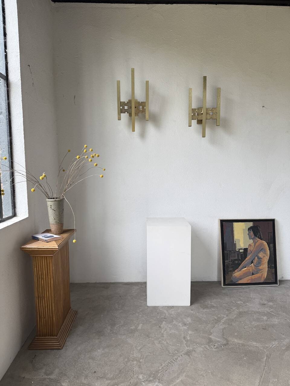 Pair of Regency brass wall lights in Italy