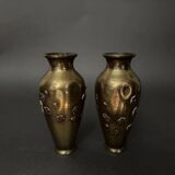 Pair of Japanese vases in chiselled bronze with inlaid bird decoration.