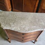 Curved chest of drawers in rosewood and marble marquetry