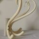 Wall-mounted parrot coat rack