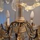 Brass chandelier with glass shaft, crystal tassel plates and daggers - 6 lights