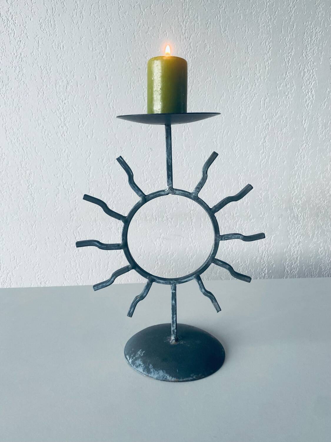 Iron sun candle holder