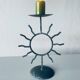 Iron sun candle holder