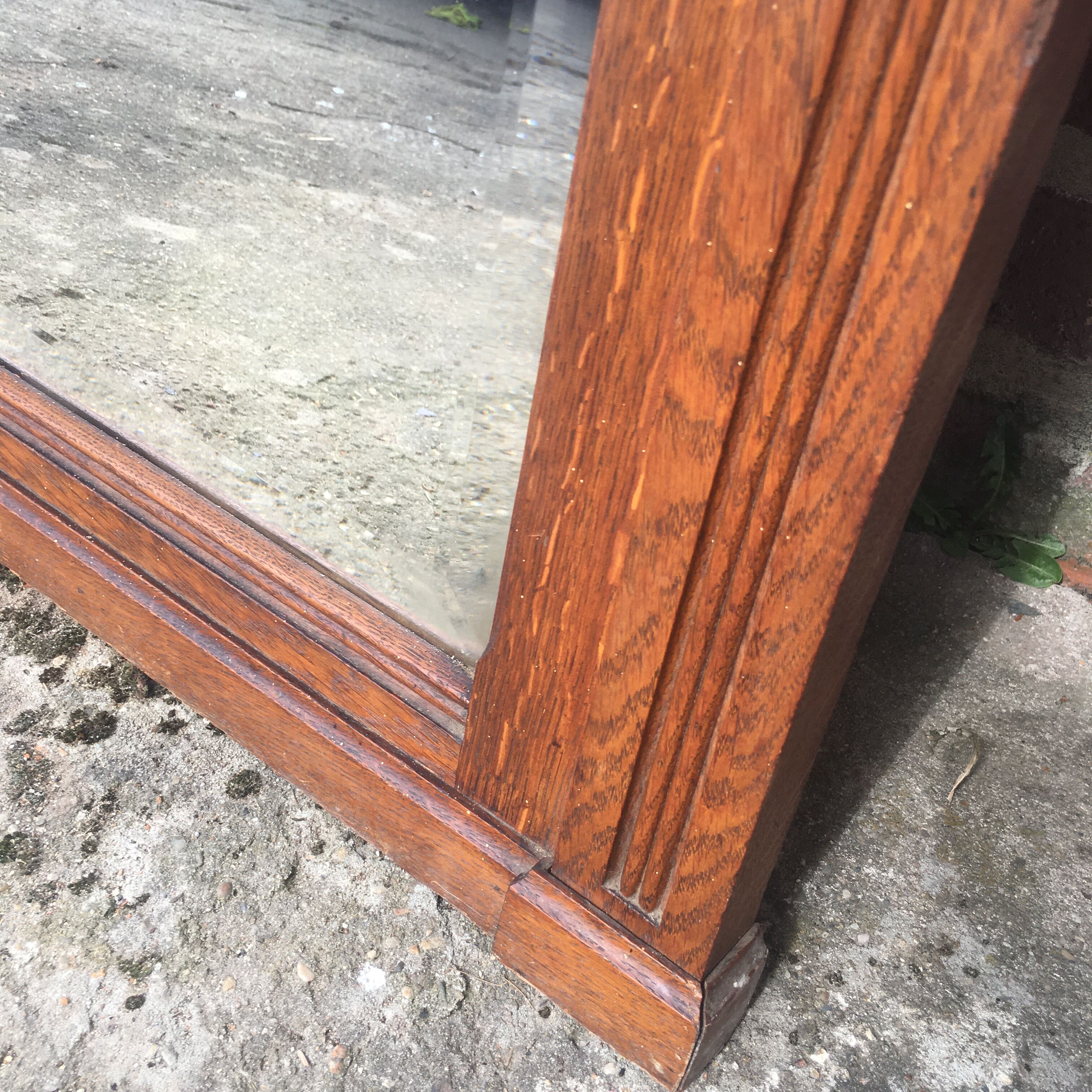 Beveled fireplace mirror