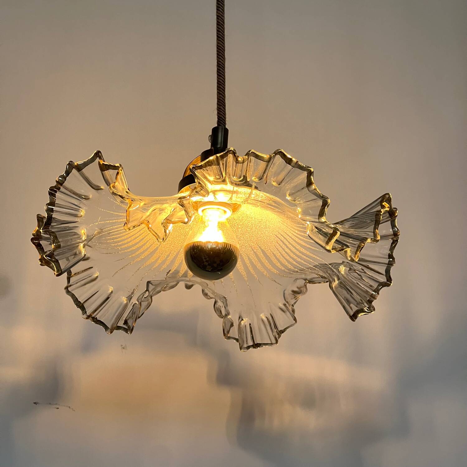 Glass and gilded pendant light with pleated edges