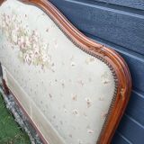 antique fabric and wood headboard