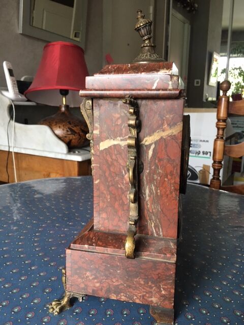 Napoleon III pink marble chimney clock