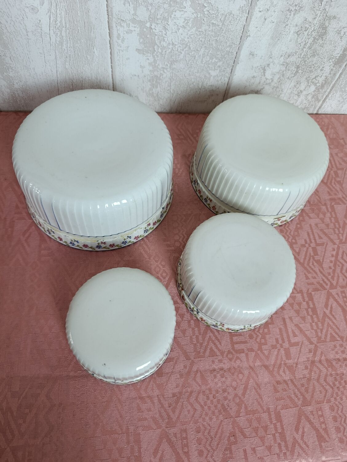 Nested porcelain salad bowls decorated