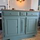 Sage green buffet with moustache legs