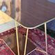 Vintage 1960s rolling dessert trolley in gold metal and formica.
