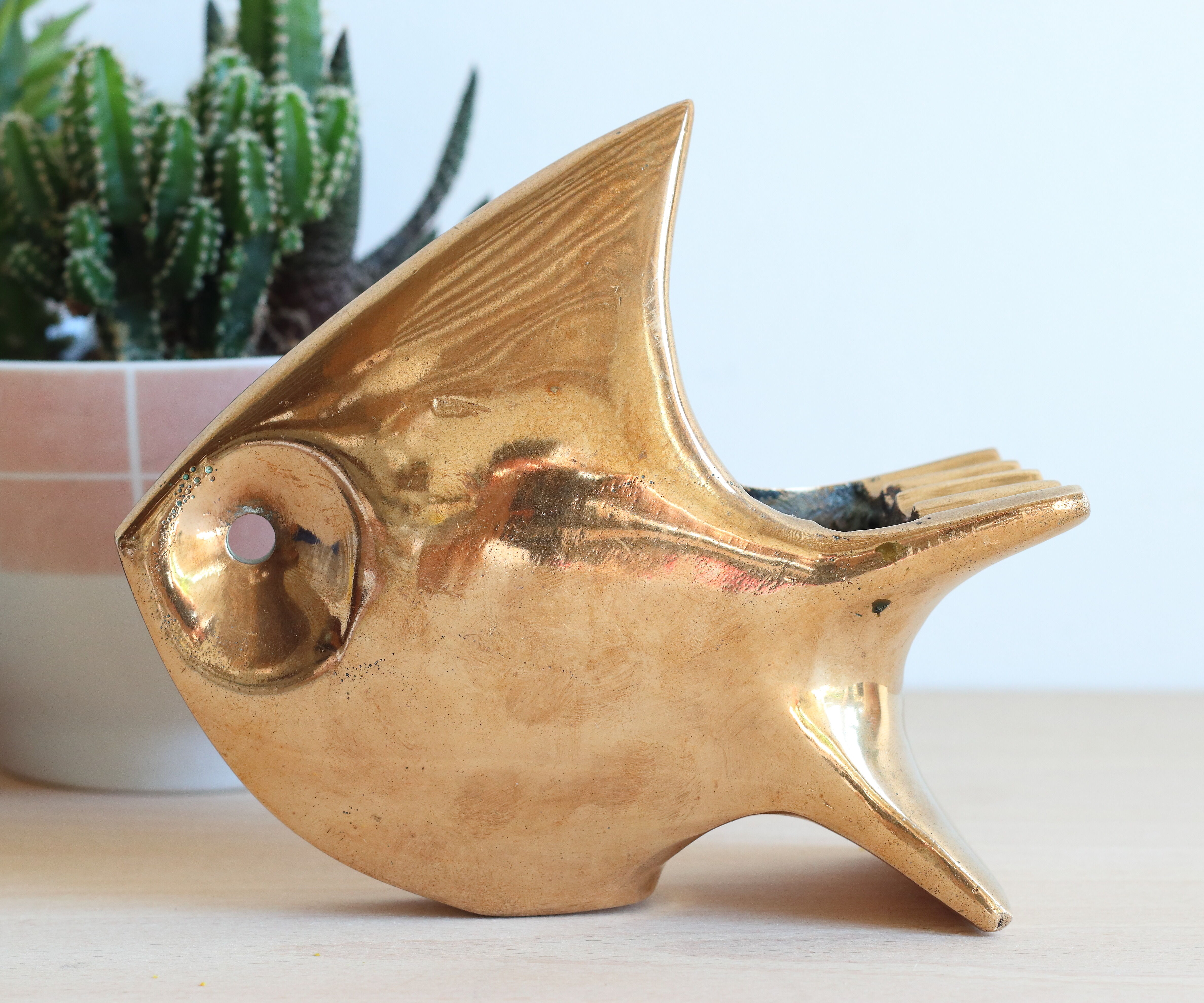 1960s solid brass ashtray in the shape of a stylized fish