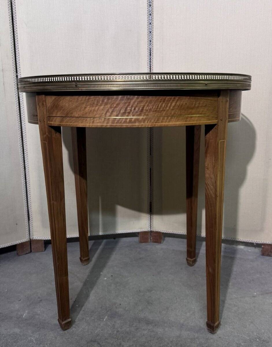 Bouillotte table in Louis XVI style with marquetry and gilded brass inlays.