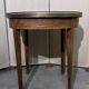 Bouillotte table in Louis XVI style with marquetry and gilded brass inlays.